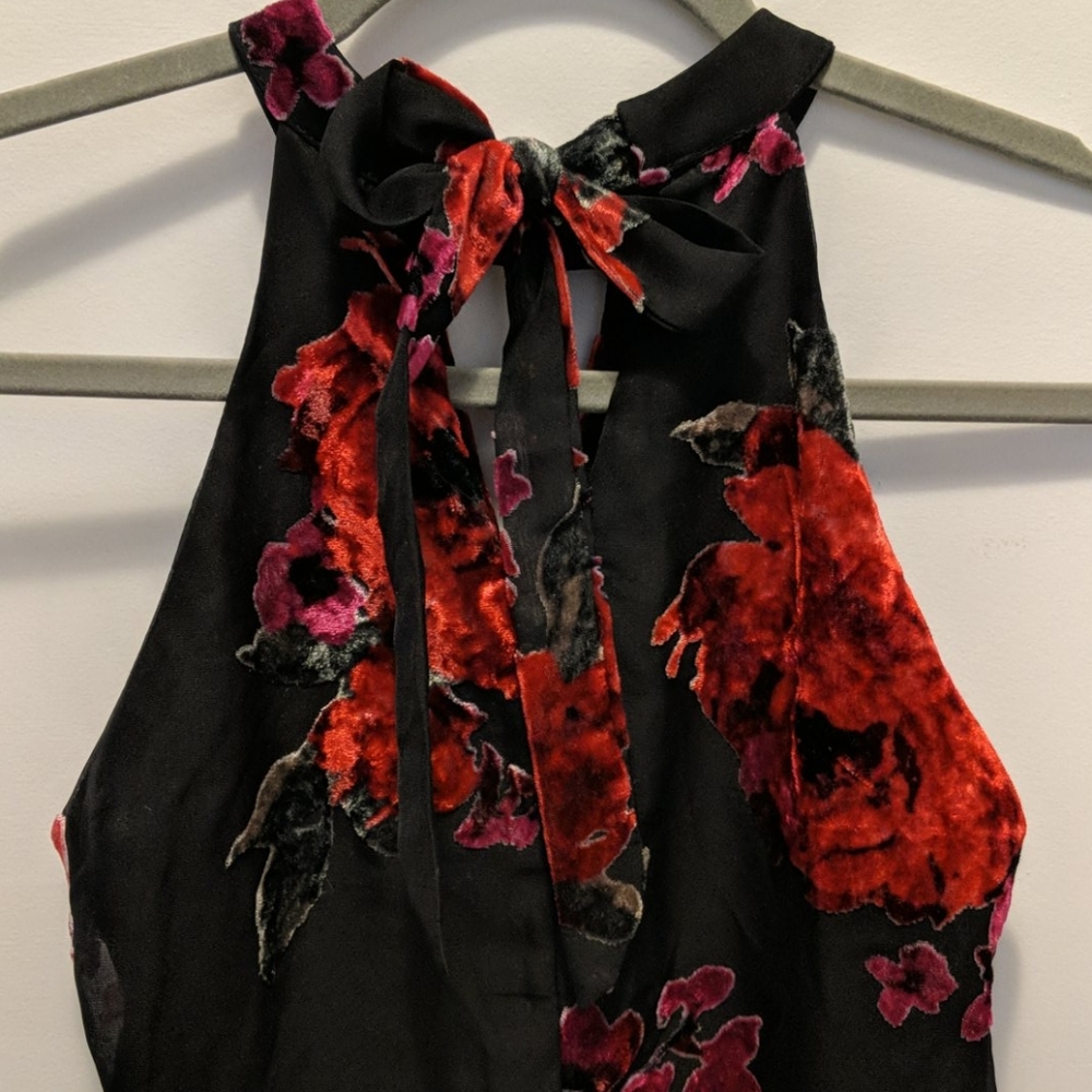 Black dress with red and green velvet floral